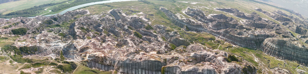 Aerial view of Dinosaur Provincial Park Alberta showcasing badlands and summer landscape