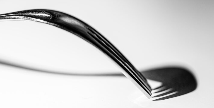 Eine Gabel und ihr Schatten