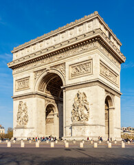 Fototapeta premium Triumphal arch (Arc de Triomphe) on Charles de Gaulle square in Paris, France