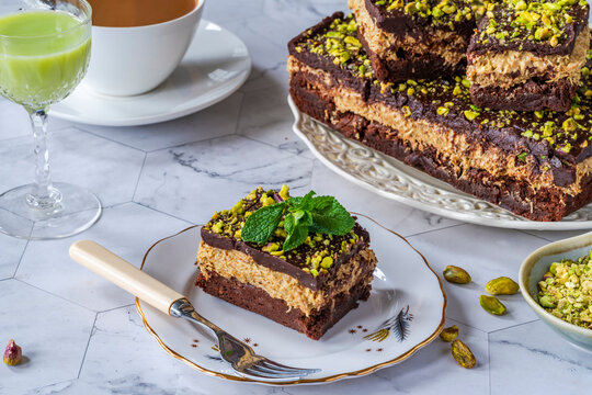 Home baked Dubai chocolate brownie cake with pistachio and kadaifi layer