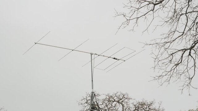 VHF radio communications directional antenna turning to search for radio signals. 