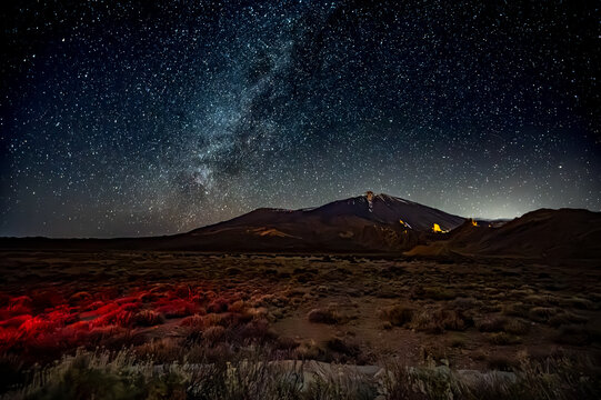 Stars gazing at night on Tenerife, mount Teide vulcano national park night excursion, astronomy educational tour, tourists destination, scenic view on mountains and stars on dark sky