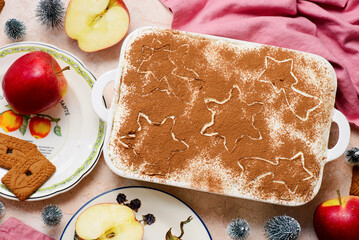 a German dessert made from cookies, apples, mascarpone, and cream. top veiw .selective focus.