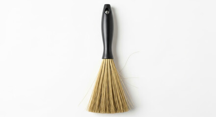 A paintbrush with a black handle and yellow bristles on transparent background