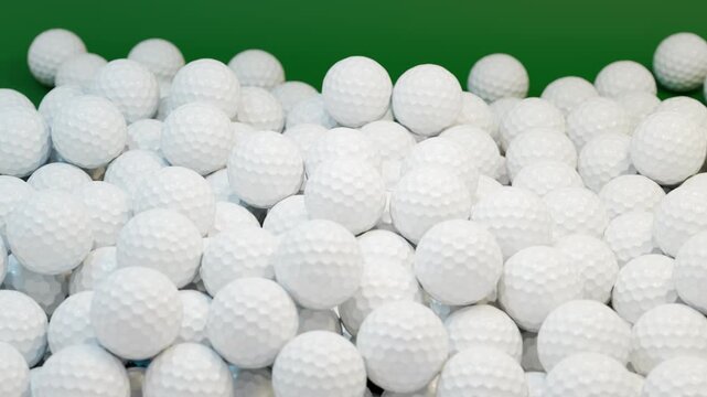 Seamless camera flyover over a field of white golf balls on green background. Smooth looping animation with continuous motion. 4K seamless loop.