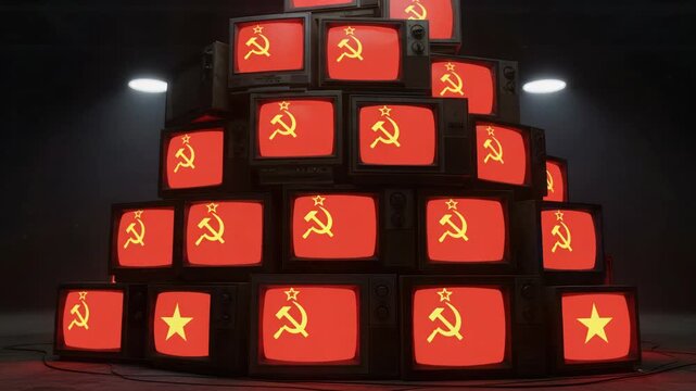 Pile of vintage televisions displaying hammer and sickle symbol, symbolizing propaganda