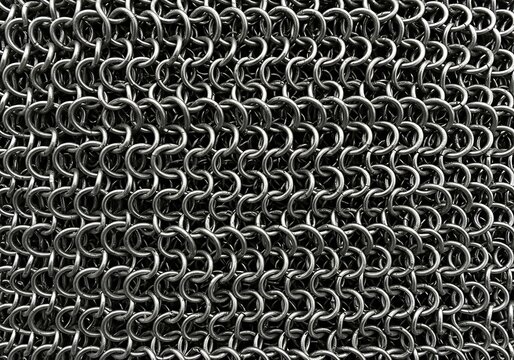 Intricate chainmail structure, protective medieval armor pattern detail