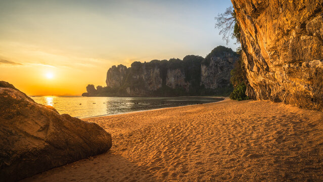 sunset at tonsai beach on tropical island railay in krabi in thailand