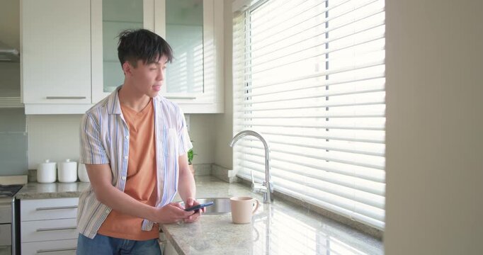 Sunlight causing Pentas plant producing clusters of red star-shaped flowers in outdoor garden pot