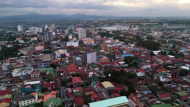 Aerial night view of Walking Street red light district in Angeles City showcasing the dense neon lights, bars, and nightlife of the Balibago district