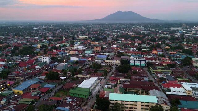 Aerial panoramic view of Angeles City with Mount Arayat at sunset 