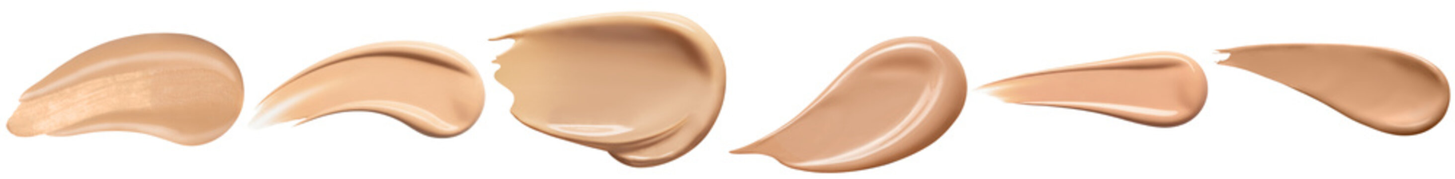 a studio photograph showcasing multiple swatches of liquid foundation or concealer cream in various skin tones and shades.