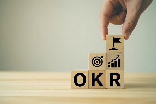 OKR Goal Setting Concept with Wooden Blocks Representing Objectives, Key Results, Business Targets, Productivity Growth, and Performance Strategy