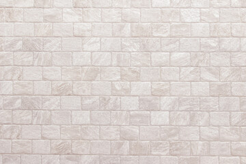 Fototapeta premium Detail of modern cream brick wall background photo. White light brick wall texture background for stone tile block painted in beige light color wallpaper modern interior and exterior backdrop design.