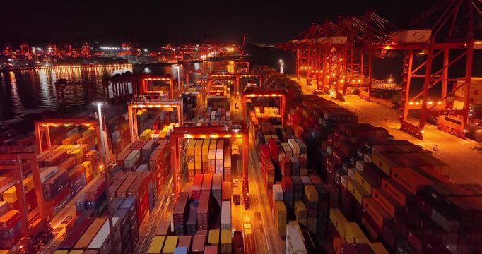 A dynamic aerial time-lapse capturing the pulse of global maritime trade, with massive container ships and synchronized cranes moving under dramatic skies.