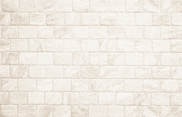 Fototapeta premium Detail of modern cream brick wall background photo. White light brick wall texture background for stone tile block painted in beige light color wallpaper modern interior and exterior backdrop design.