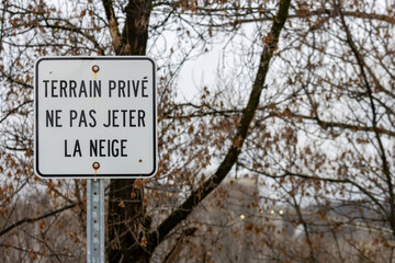 Canada, Quebec, 27 November 2025 : Private property sign warning not to throw any snow here