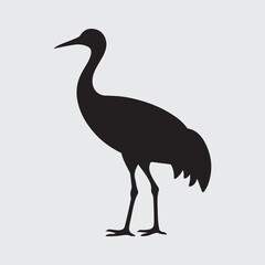 Obraz premium Silhouette of a Crane Bird Standing on One Leg