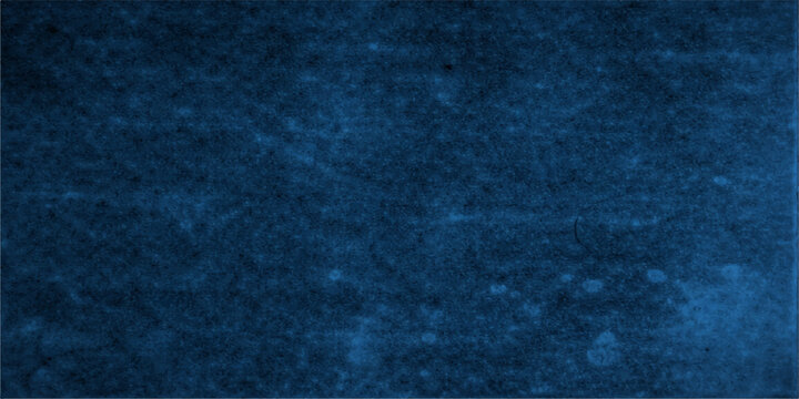 A vintage blue grunge background features a dark textured fabric pattern and rough denim material surface, creating an abstract textile wallpaper design with a weathered paper canvas backdrop