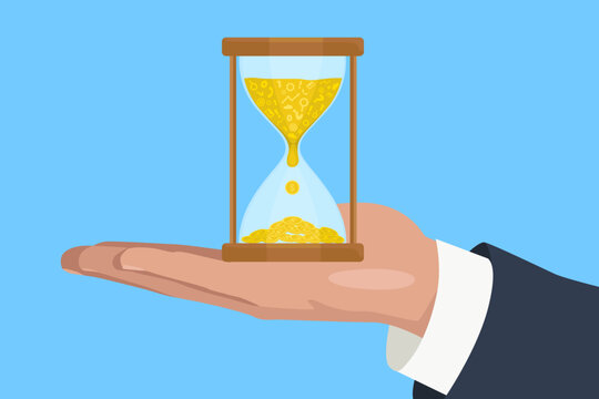 Hand holding hourglass. Hourglass with gold coins inside on blue background. Time and value concept