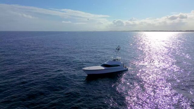 An amazing drone video of a Hatteras fishing boat kite fishing off the coast of Palm Beach, FL.