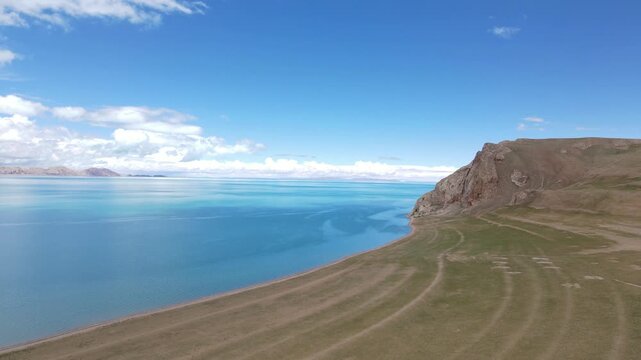 Drone Ascending Rise from Turquoise Siling Co Lake, Tibet China