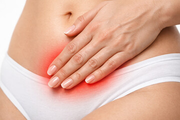 Woman belly pelvic pain uterine fibroids myoma endometrial polyp gynecology female health abdomen Woman belly with hand over pelvic pain showing uterine fibroids myoma endometrial polyp concern