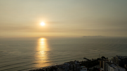 sunset over the sea of Lima