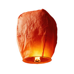 Isolated shot of a bright orange paper lantern with flames at its base, against black backdrop