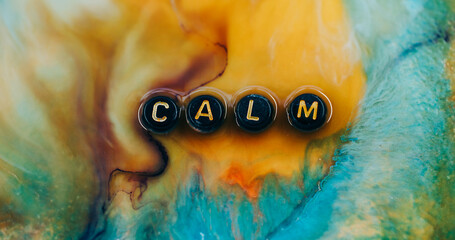 Ink texture. Marble background. Defocused orange blue yellow color bright letters calm relaxation black blend on art acrylic abstraction.