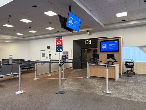 Empty Delta Air Lines departure gate C8 interior at SFO San Francisco International Airport - San Francisco, California, USA - September 24, 2025