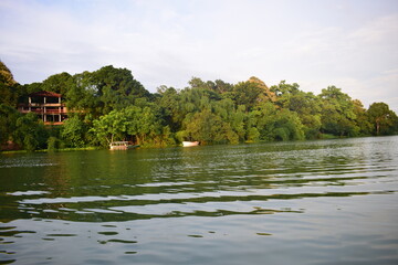 Obraz premium Kaptai Lake, Rangamati — Jewel of the Hill Tracts. Kaptai Lake in Rangamati is the largest man-made lake in Bangladesh, surrounded by green hills and peaceful waters. 