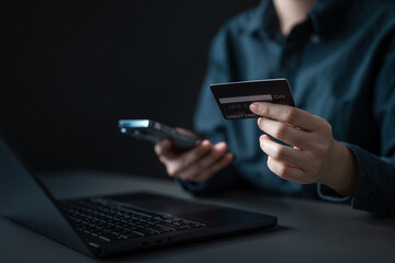 Online shopping concept with credit card, smartphone, and laptop for secure digital payment....