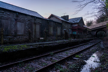 Obraz premium Disused Llangefni railway station with overgrown tracks on Anglesey