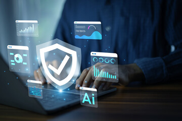 Businessman Using Computer with AI Cybersecurity Digital Shield to Protect Sensitive Data and Prevent Online Threats in Modern Business Environment