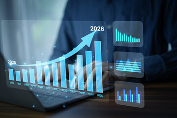 Businessman using computer with AI to analyze financial data and optimize investment portfolio.