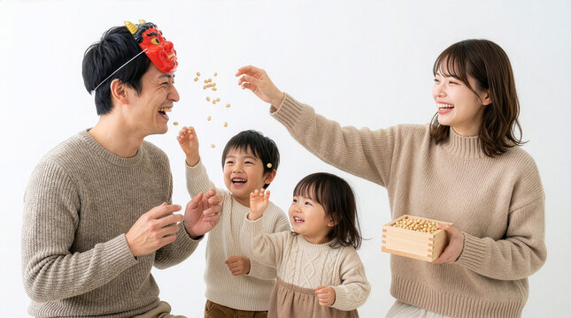 節分で豆まきをする家族