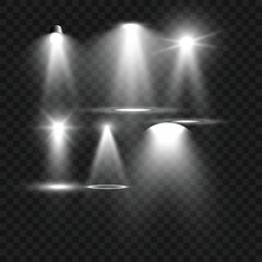Realistic White Stage Spotlights and Light Beam Effects Set on Transparent Background. Vector