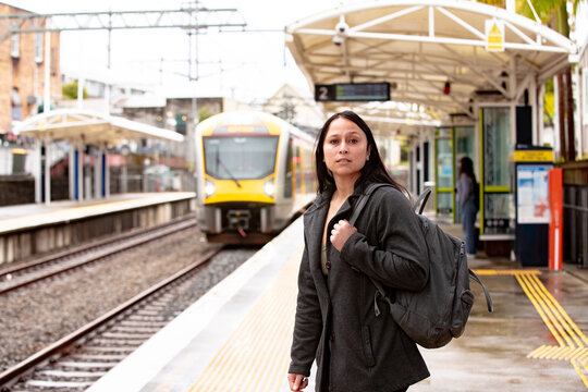 Maori woman on a suburban train platform in Auckland