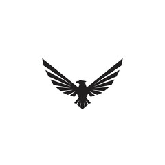 Fototapeta premium Stylized Black Eagle Silhouette with Wings Spread Wide on White Background