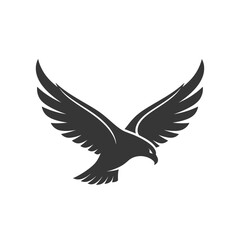 Fototapeta premium Silhouette of a soaring eagle with outstretched wings against a white background