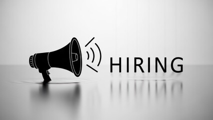 Hiring" announced with a black megaphone icon casting reflections