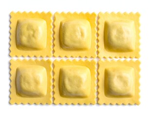 Six uncooked square-shaped pasta pieces with ridged edges on white