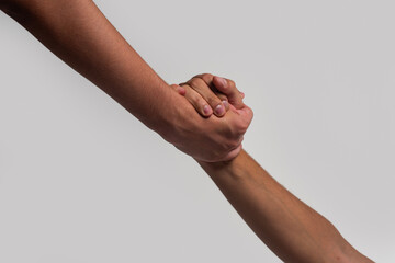 Helping hands on white background. Giving a help hand. Rescue, helping hands gesture. Helping hand...