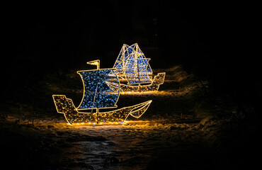 Beautiful Christmas holiday decorations. Shining garden figures