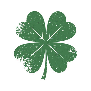 Green four leaf clover with distressed texture