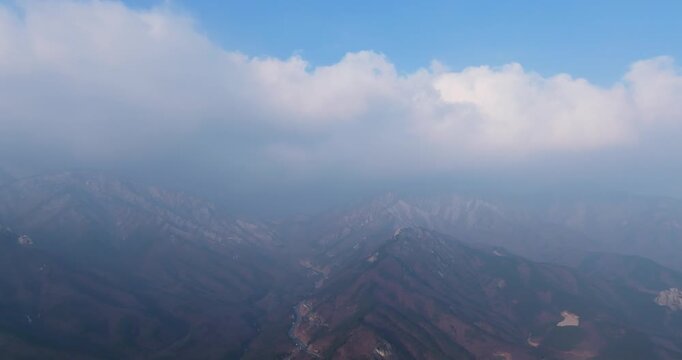 Majestic granite peaks of Ulsanbawi with scenic mountain road, South Kore