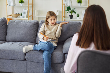 Kid talking to psychologist about feelings and thoughts with trust, discussion on consultation....