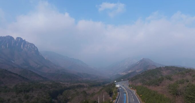 Majestic granite peaks of Ulsanbawi with scenic mountain road, South Kore