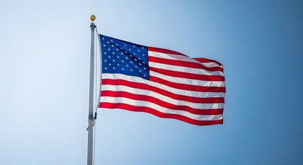 Fototapeta premium The american flag waving in the wind